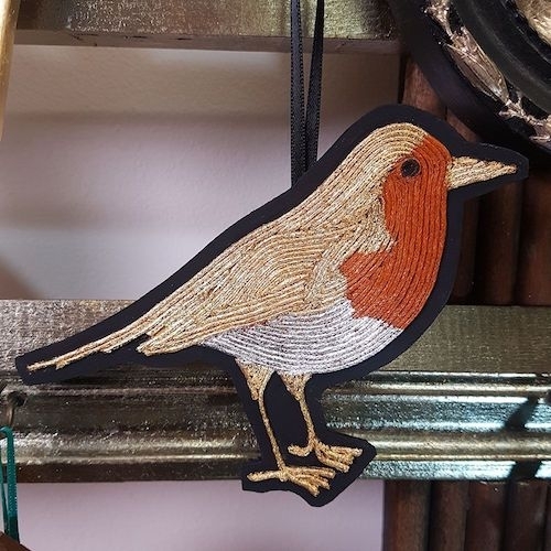 photo of Christmas tree decoration: a robin made from string with oil gilding in 23.5 carat gold leaf and 6 carat white gold leaf