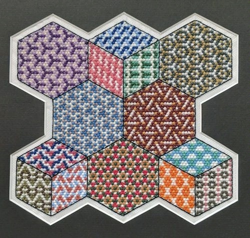 hexagonal cross-stitch symmetry sampler