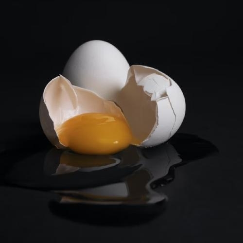 photo of a broken raw egg