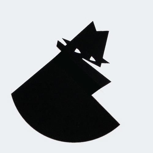 Black and white cartoon style silhouette of a bad guy in hat and cape looking back over his shoulder