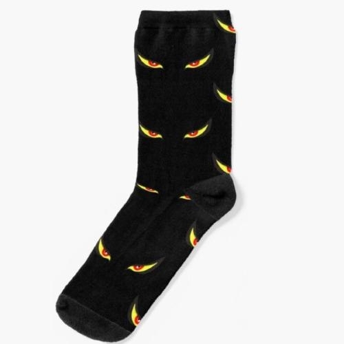 black sock decorated with yellow and red evil looking eyes