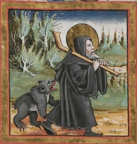 a goofy-looking small black bear with mouth open follows along behind an old man in a monk's robe and knapsack on a country road