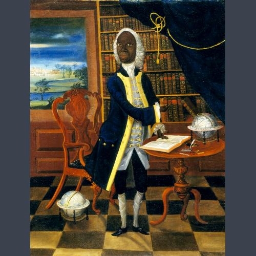 A historical painting depicts a Black man in 18th-century attire standing in a study or library. He is dressed in a blue coat with yellow trim, white stockings, and black shoes, and is wearing a white wig. The surroundings feature a large bookshelf filled with books, a wooden chair, a table with an open book, his hand lying upon it, a globe, and a celestial globe. A window behind him shows a landscape with a building and trees under a twilight blue sky. The floor is checkered, and a curtain with a intricate tassel hangs to the right.