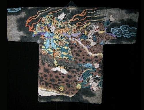 image of Fireman's coat decorated with a depiction of the Toad Spirit