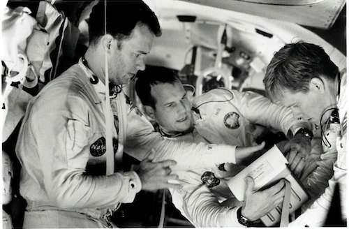 Black and white still of Tom Hanks, Bill Paxton, and Kevin Bacon as astronauts Jim Lovell, Fred Haise, and Jack Swigart in the film Apollo 13