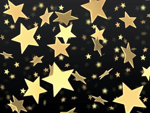floating gold stars against a black background